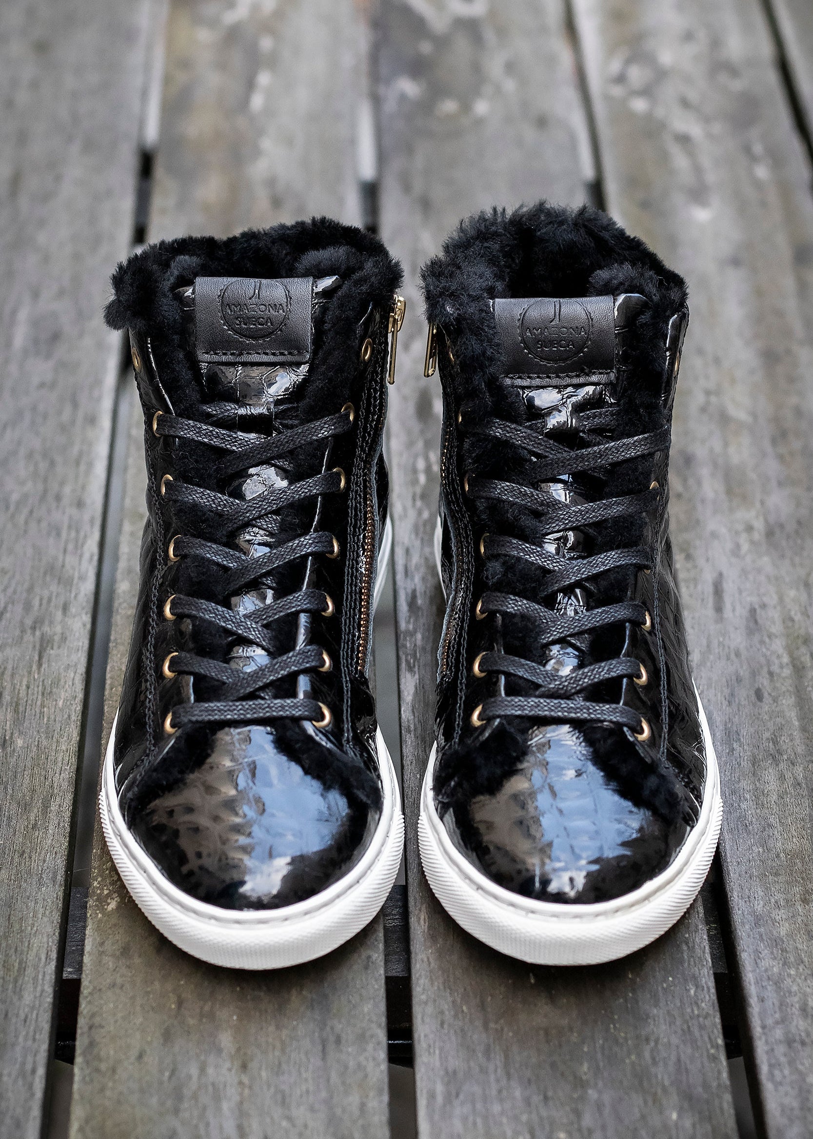 Shearling lined high-top sneakers in black croco gloss